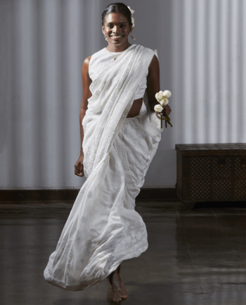 Woman wearing a Chikanwork Chalk Georgette Saree