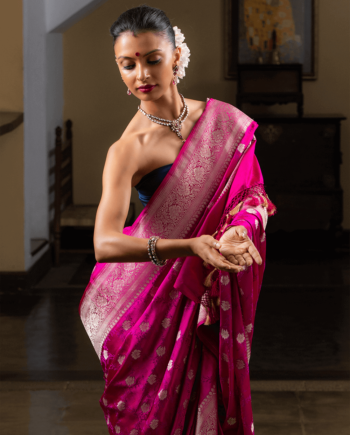Woman wearing a Sama Magenta Pink Saree