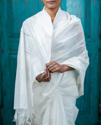 Kanchi White On White Saree wearing woman front view